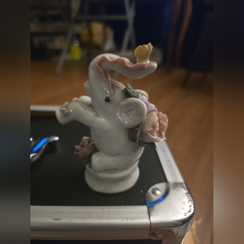 Porcelain Elephant Figurine with Floral Accents